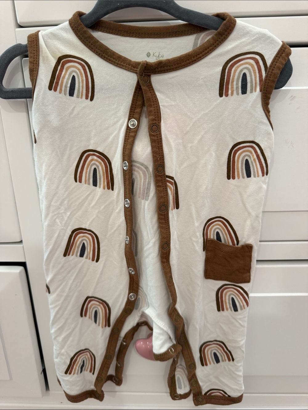 Kyte BABY Cream One-Piece with Brown Trim and Rainbow Motif
